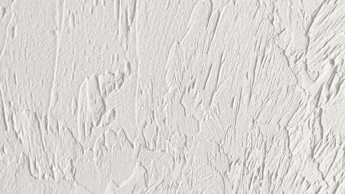 Hawk and trowel drywall texture with overlapping sweeping layers of mud