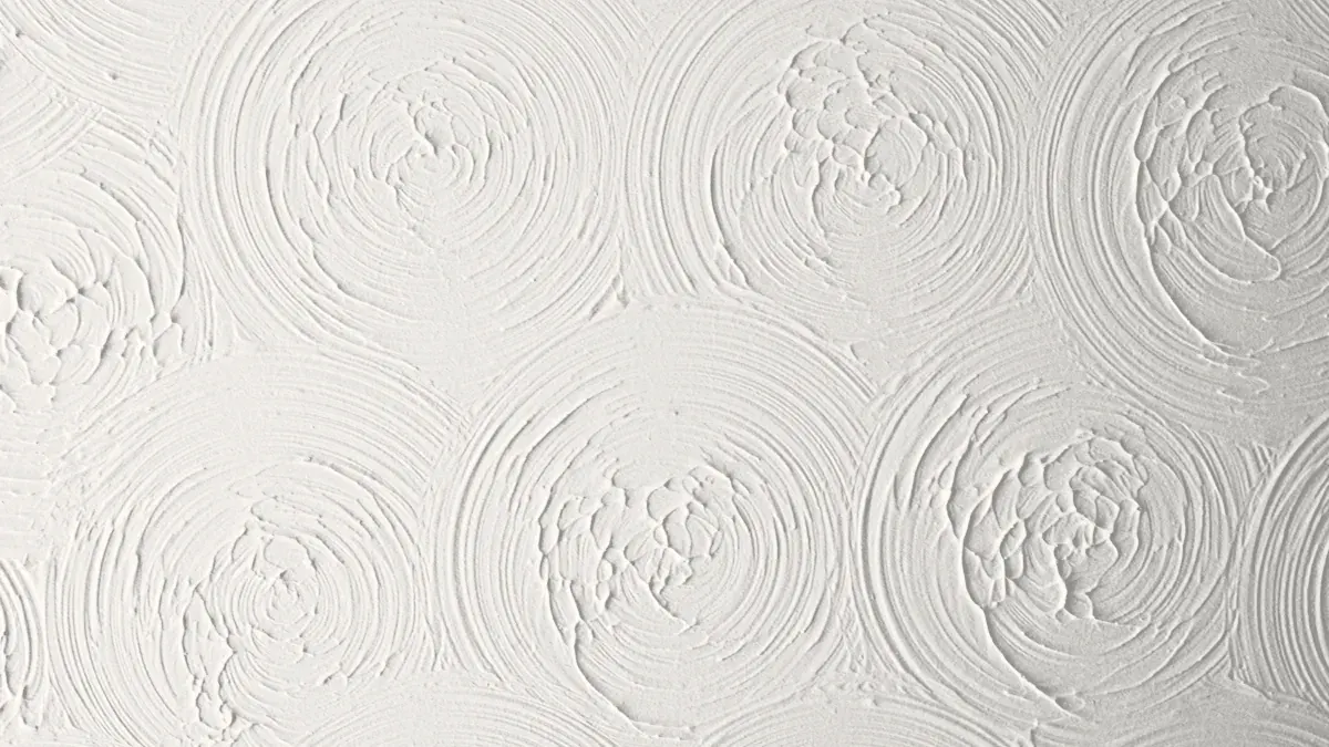 Swirl drywall texture with overlapping circular brush loops