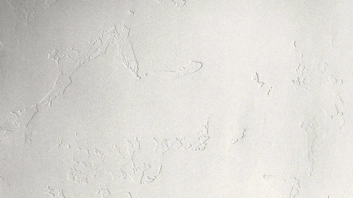 Santa Fe drywall texture with broad smooth areas and raised edges