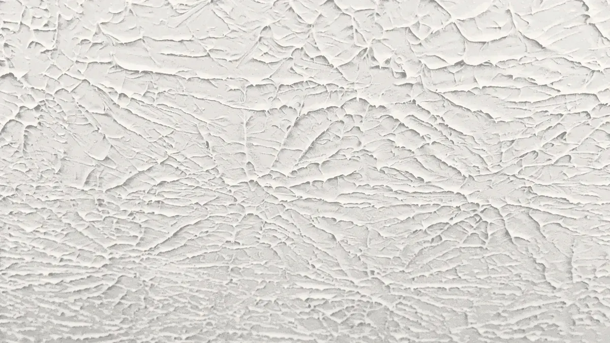 Stomp drywall ceiling texture with crisscrossing raised ridges