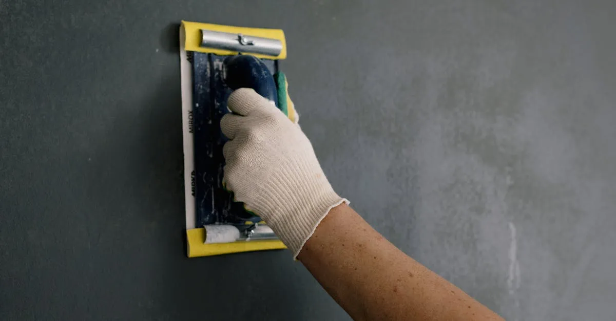 Checking a stained surface by hand before deciding on a repair
