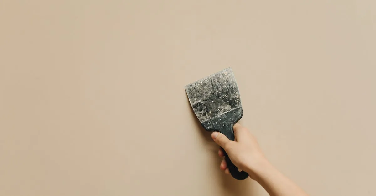 Applying joint compound to a wall to rebuild texture before blending
